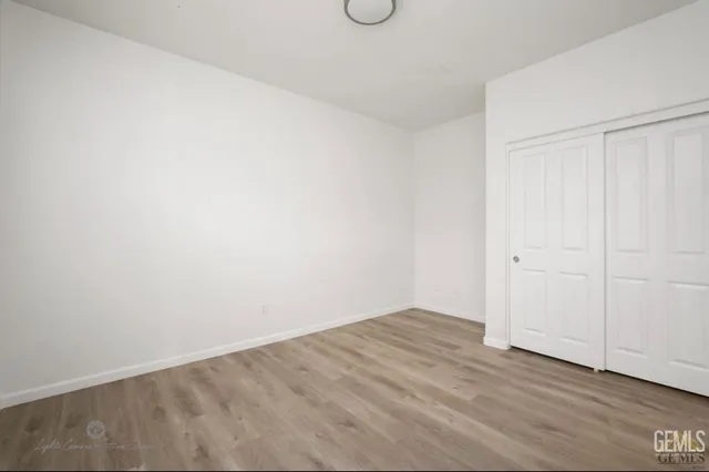 a view of small space with wooden floor