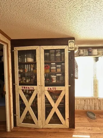 a room with table and chairs