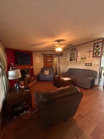 a bedroom with furniture and a lamp