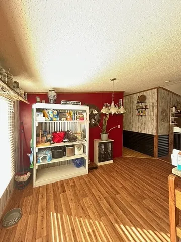 a view of a swimming pool with a bench