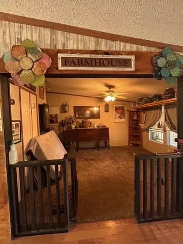 a view of a chairs and table in a patio