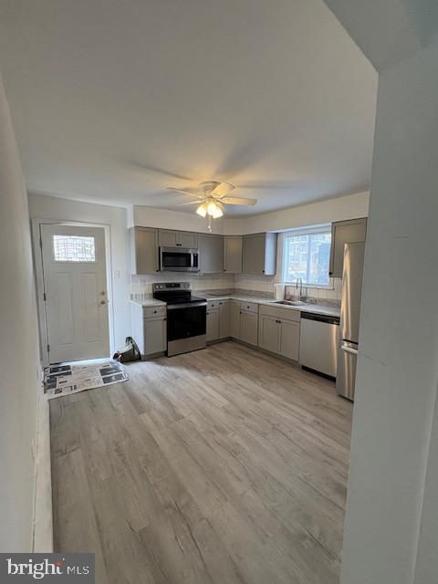 55 North Spring Garden Street Ambler, PA 19002 - Photo 4 of 10 a large kitchen with cabinets and a stove