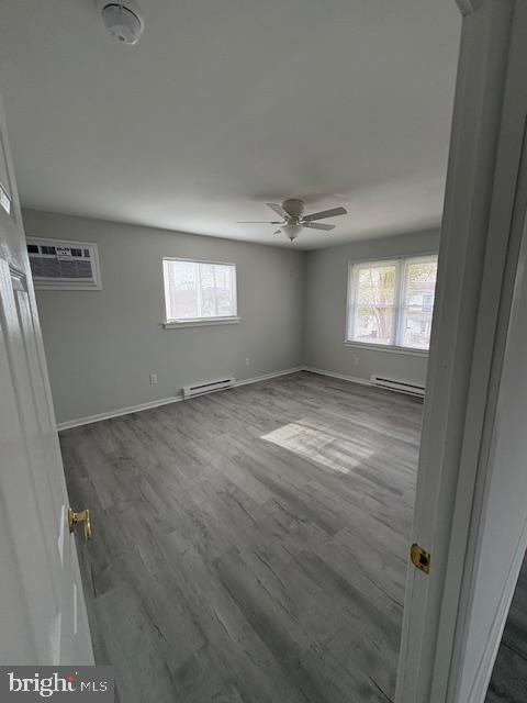 55 North Spring Garden Street Ambler, PA 19002 - Photo 9 of 10 an empty room with wooden floor and windows