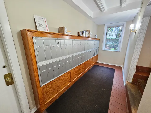 a view of balcony with furniture