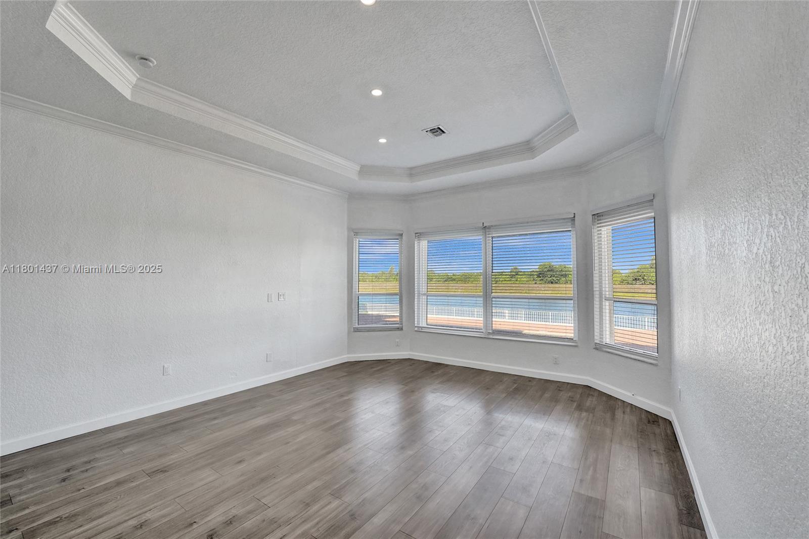 3360 Southwest 195th Terrace Miramar, FL 33029 - Photo 32 of 65 wooden floor in an empty room with a window