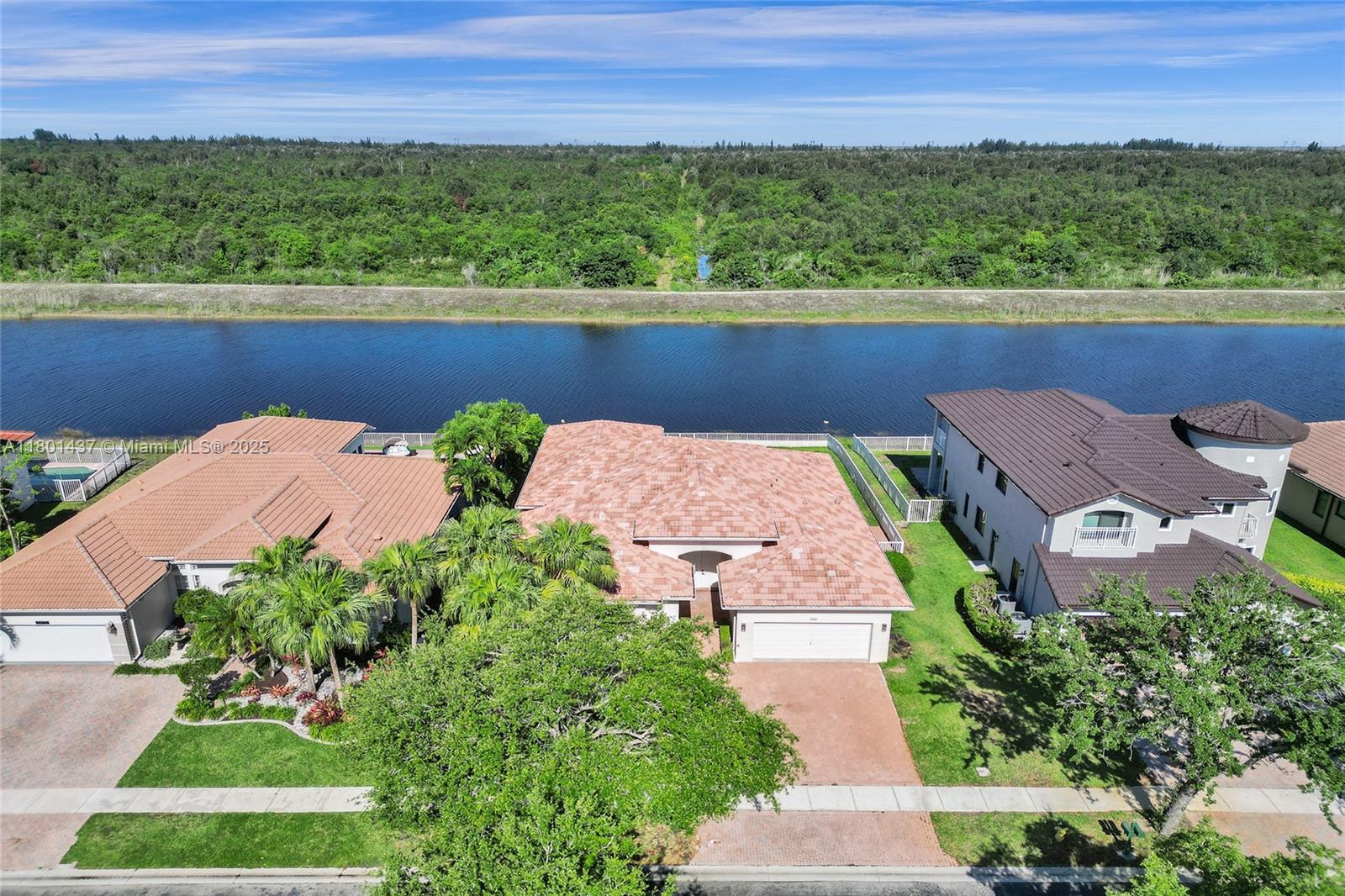 3360 Southwest 195th Terrace Miramar, FL 33029 - Photo 5 of 65 an aerial view of a house with a garden and yard view