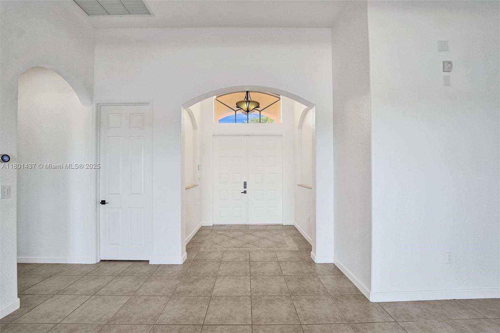 3360 Southwest 195th Terrace Miramar, FL 33029 - Photo 10 of 65 a view of a hallway to a bedroom