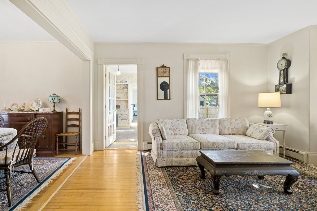 39 Summer Street Danvers, MA 01923 - Photo 12 of 46 a living room with furniture a rug and a table