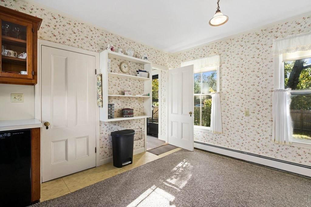 39 Summer Street Danvers, MA 01923 - Photo 15 of 46 a view of livingroom with hardwood floor and a fireplace
