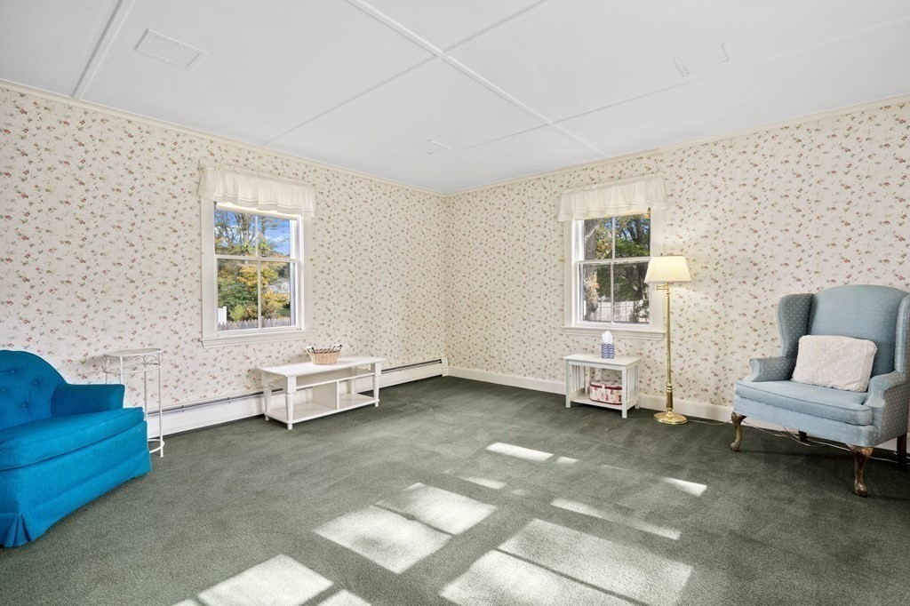 39 Summer Street Danvers, MA 01923 - Photo 20 of 46 a living room with furniture and a couch