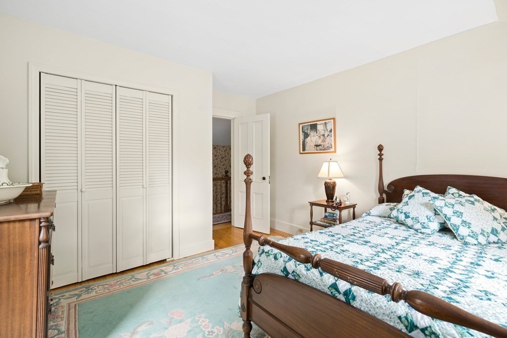 39 Summer Street Danvers, MA 01923 - Photo 22 of 46 a bedroom with a bed and a window