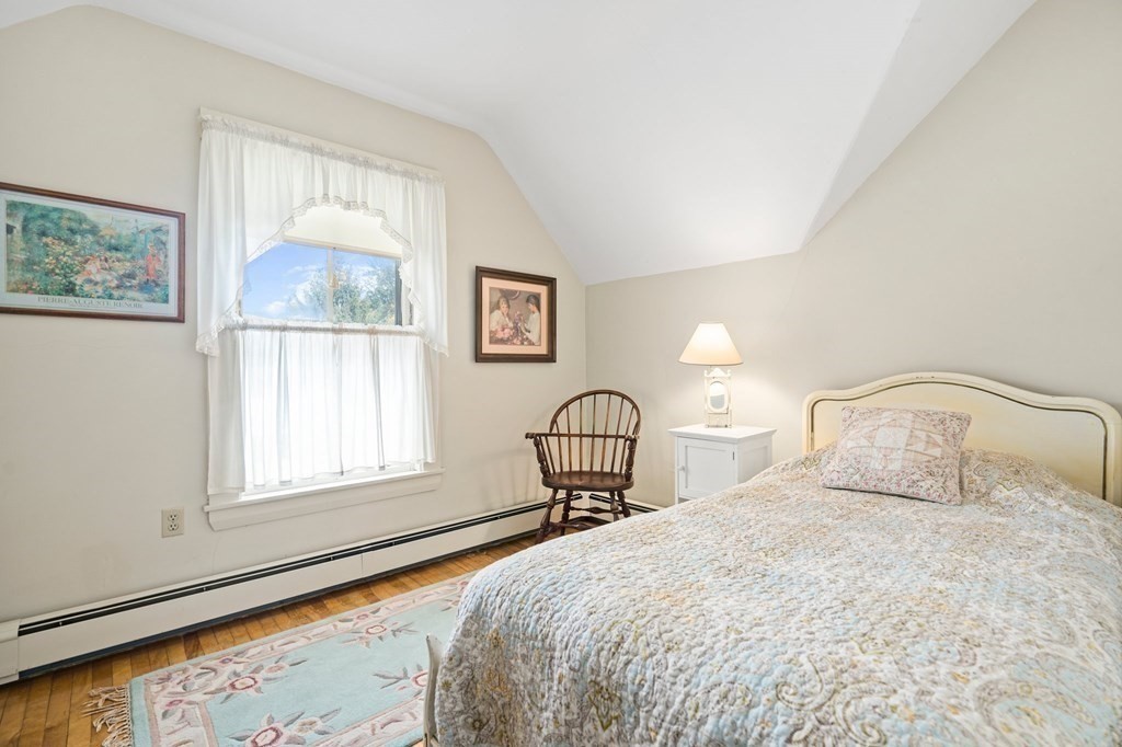 39 Summer Street Danvers, MA 01923 - Photo 27 of 46 a bedroom with a bed and a window