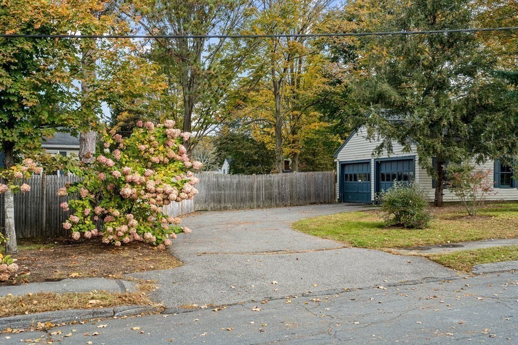 39 Summer Street Danvers, MA 01923 - Photo 37 of 46 a front view of a house with a garden