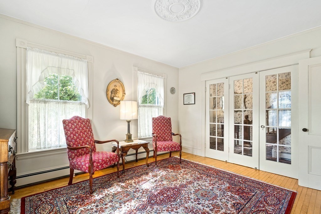39 Summer Street Danvers, MA 01923 - Photo 6 of 46 a living room with furniture and a window