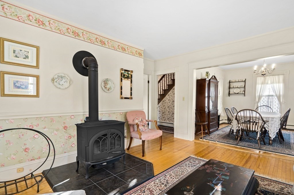 39 Summer Street Danvers, MA 01923 - Photo 8 of 46 a living room with furniture a rug and white walls