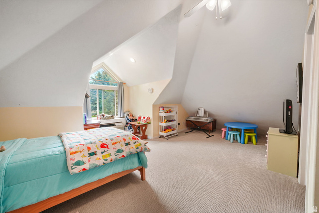 357 South 320 W Street Lindon, UT 84042 - Photo 17 of 41 Carpeted room with a vaulted ceiling and a large arched window