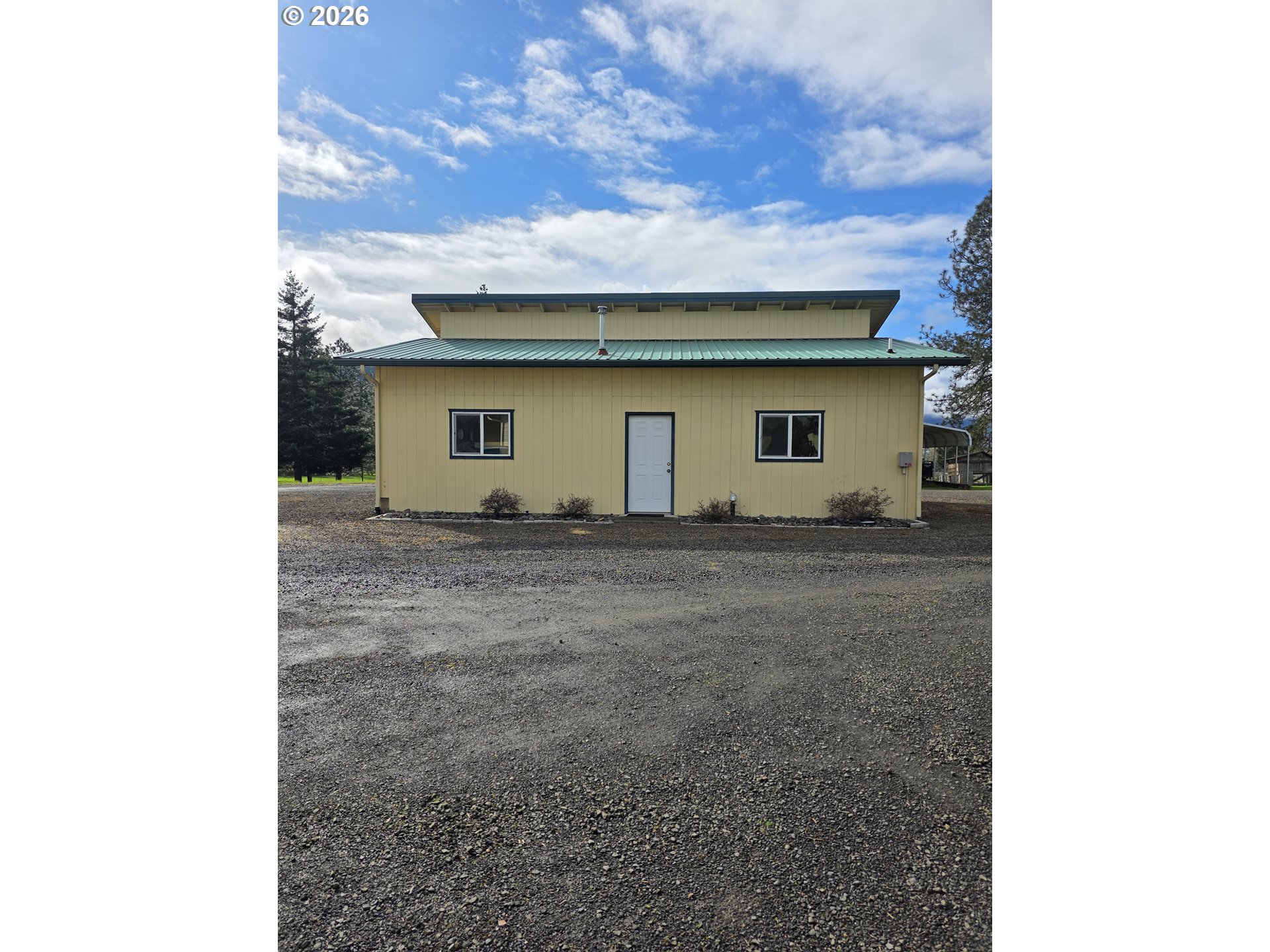 1909 Southwest Duke Road Sutherlin, OR 97479 - Photo 4 of 30 a view of a house with a backyard