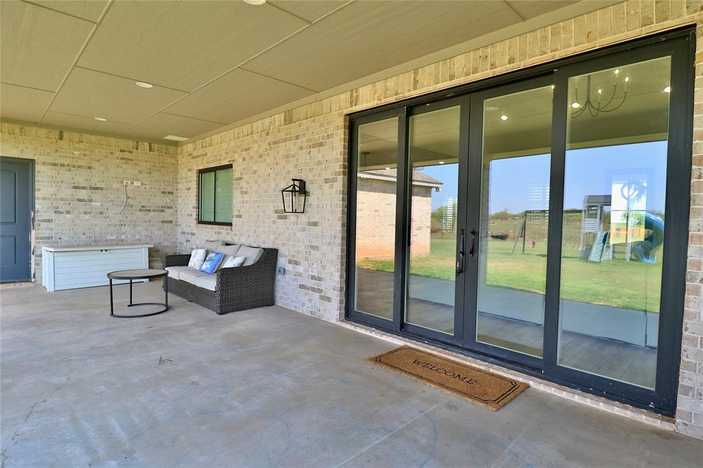 2610 Weetu Road Iowa Park, TX 76367 - Photo 21 of 35 a view of a lobby with furniture and floor to ceiling window