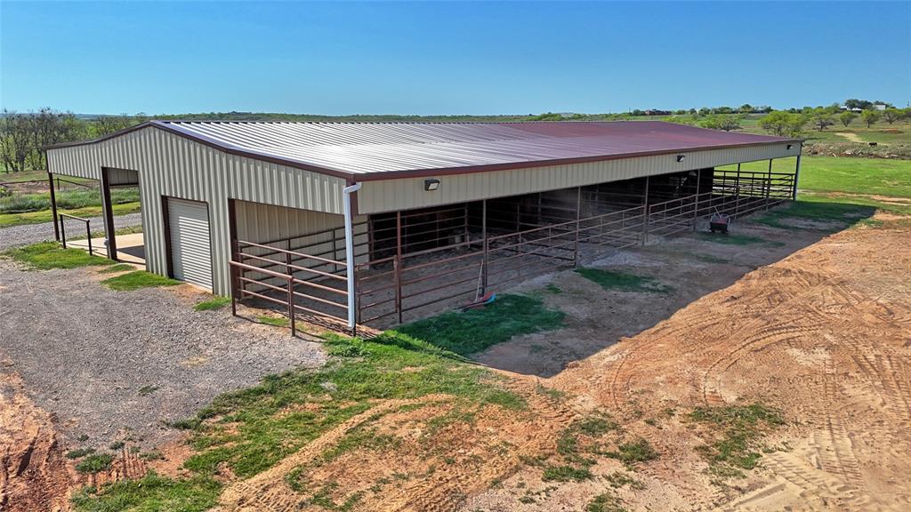 2610 Weetu Road Iowa Park, TX 76367 - Photo 22 of 35 a view of house with backyard and outdoor seating