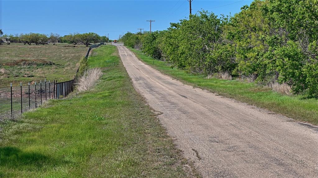 2610 Weetu Road Iowa Park, TX 76367 - Photo 34 of 35 a view of a street with a yard
