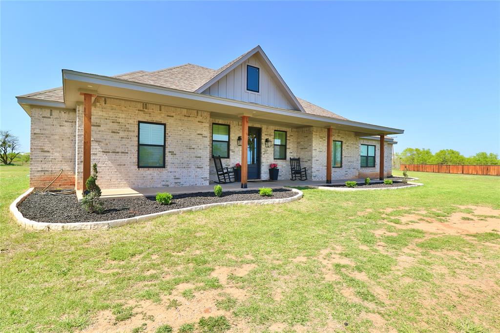 2610 Weetu Road Iowa Park, TX 76367 - Photo 6 of 35 a front view of house with yard