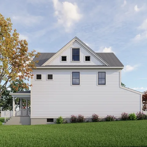 a view of a house with backyard