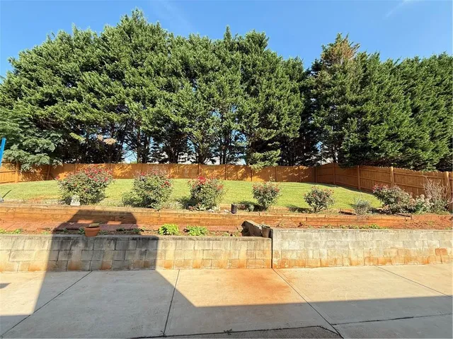 a view of an ocean with trees