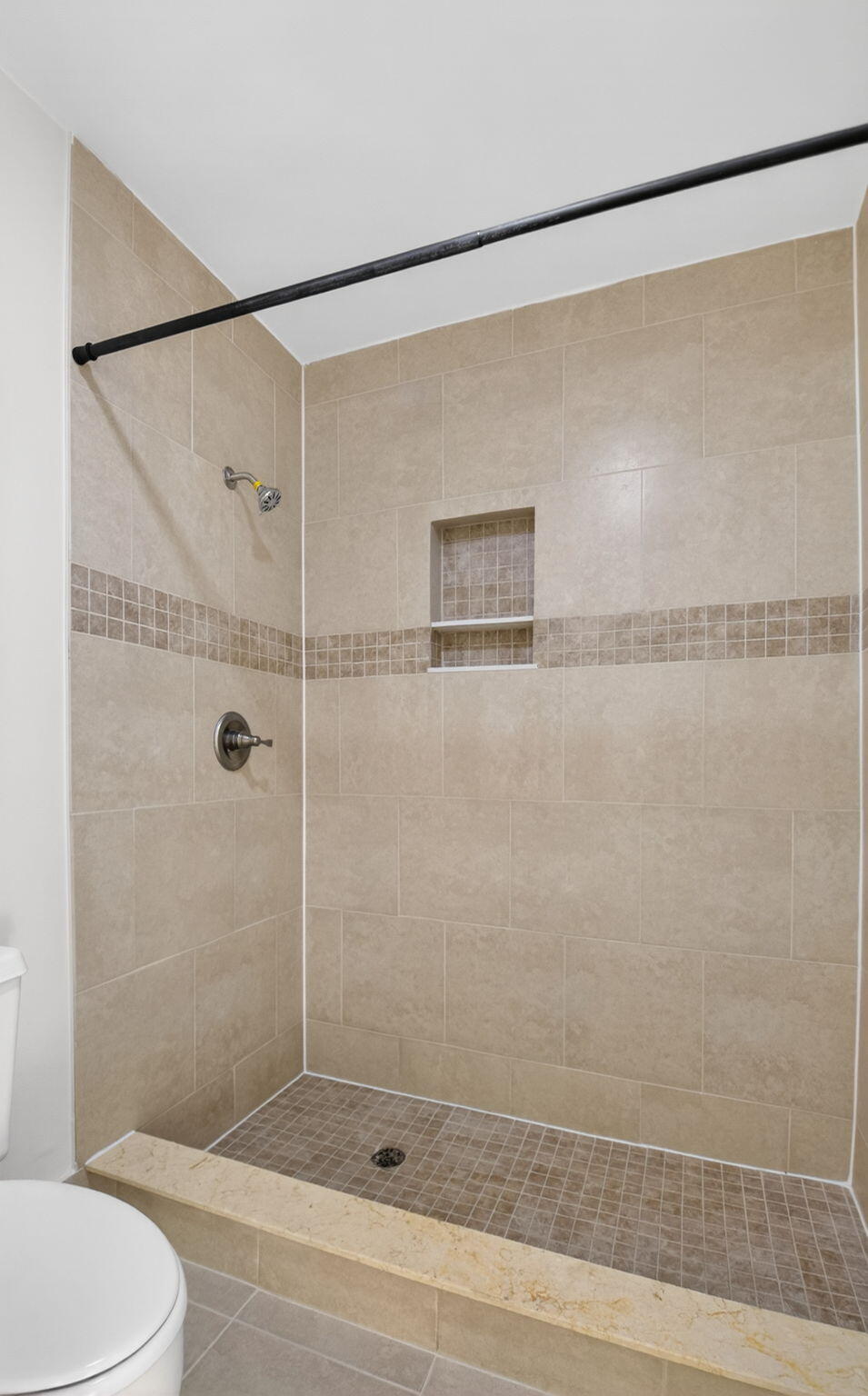 3143 Kingswood Terrace, Unit 3143 Boca Raton, FL 33431 - Photo 23 of 66 a bathroom with a shower and a toilet