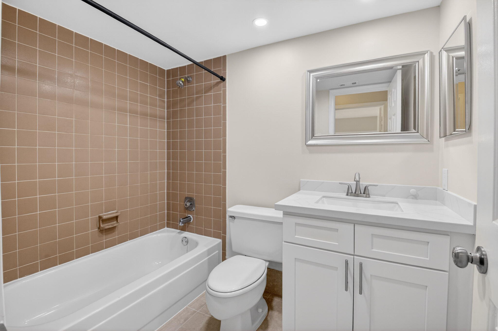 3143 Kingswood Terrace, Unit 3143 Boca Raton, FL 33431 - Photo 27 of 66 a bathroom with a sink a toilet and shower