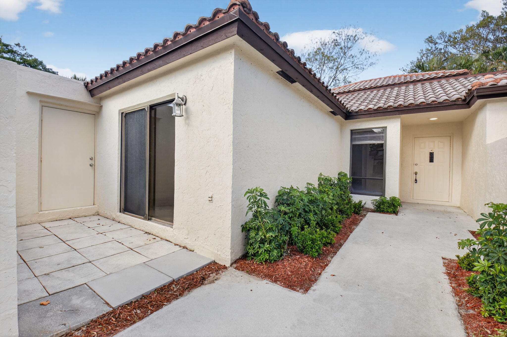 3143 Kingswood Terrace, Unit 3143 Boca Raton, FL 33431 - Photo 3 of 66 PRIVATE COURTYARD ENTRY
