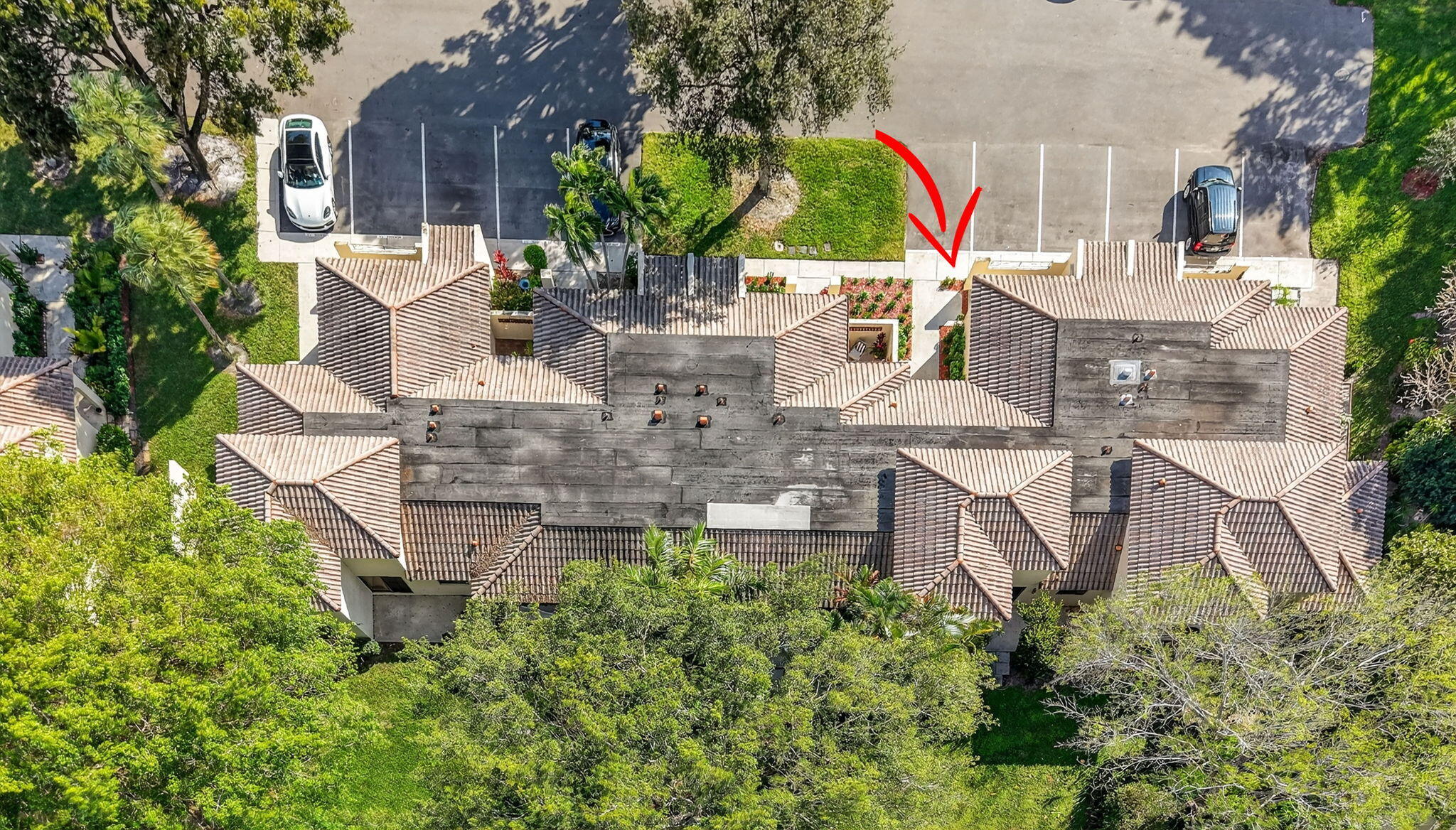3143 Kingswood Terrace, Unit 3143 Boca Raton, FL 33431 - Photo 38 of 66 an aerial view of a house with garden space and street view