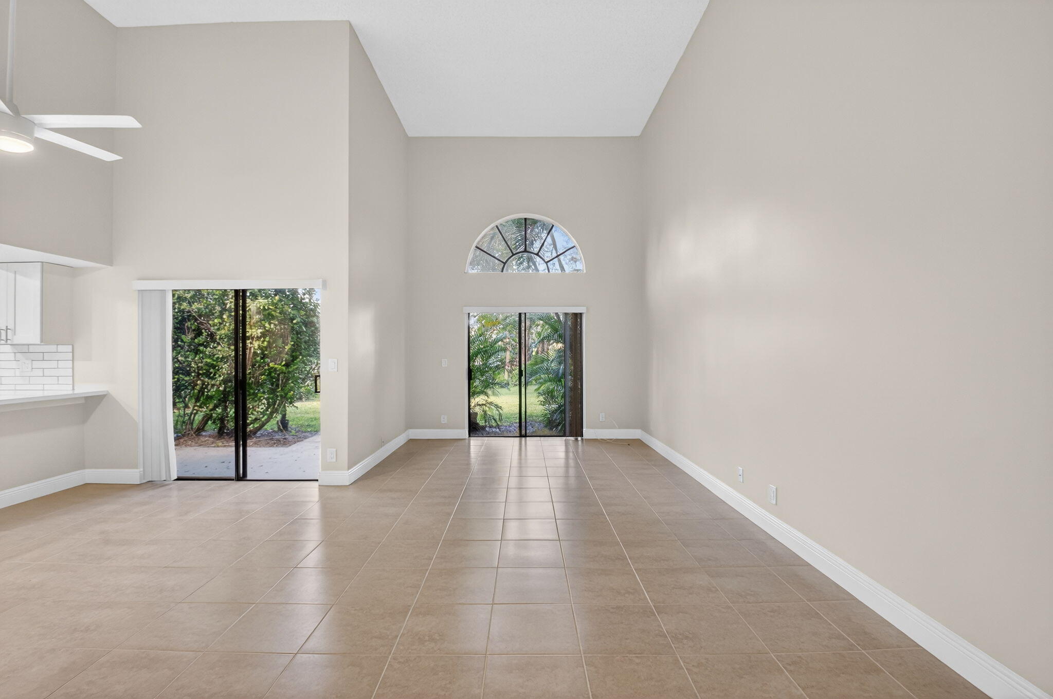 3143 Kingswood Terrace, Unit 3143 Boca Raton, FL 33431 - Photo 5 of 66 a view of an empty room with a window