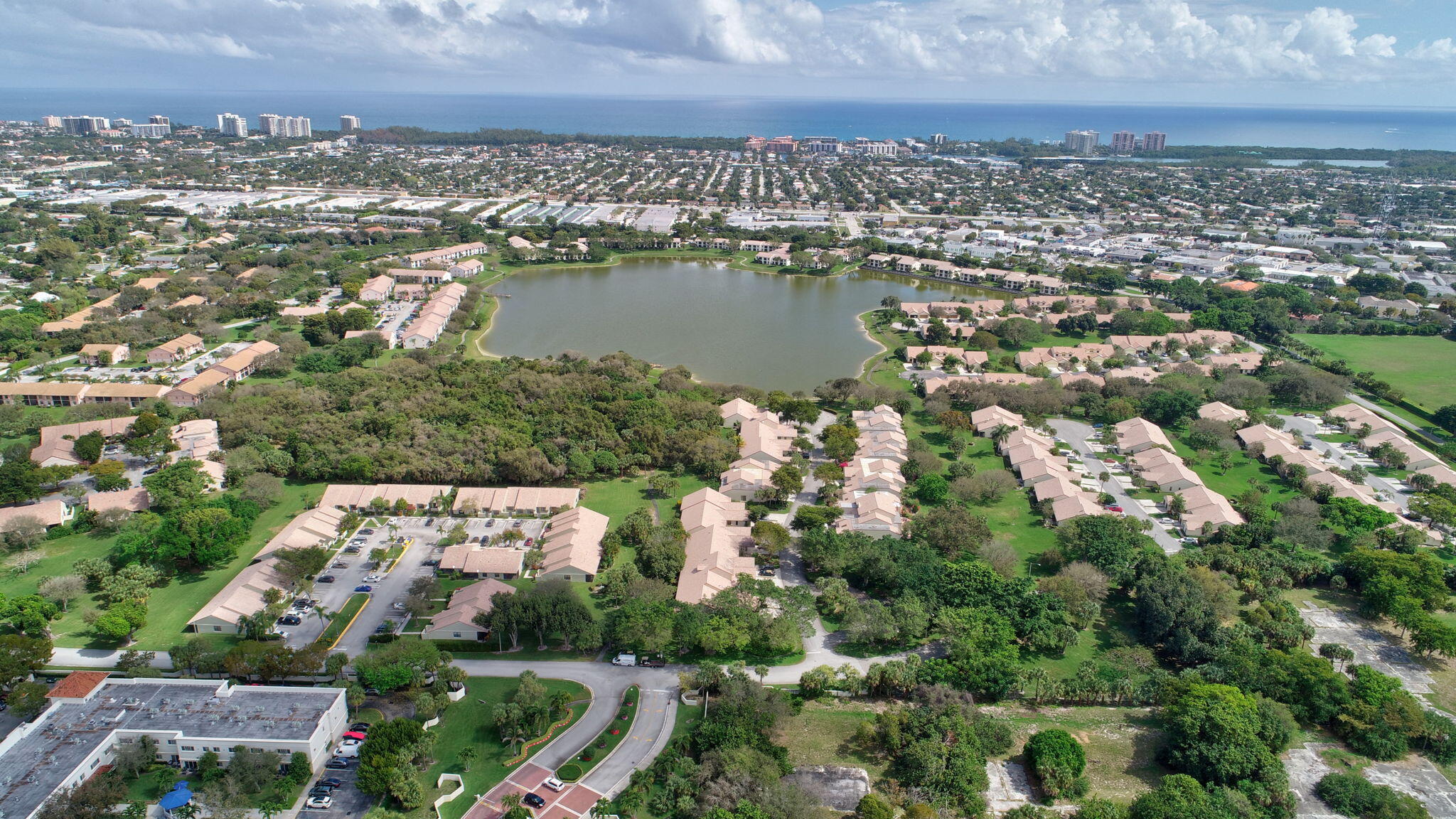 3143 Kingswood Terrace, Unit 3143 Boca Raton, FL 33431 - Photo 59 of 66 an aerial view of multiple house