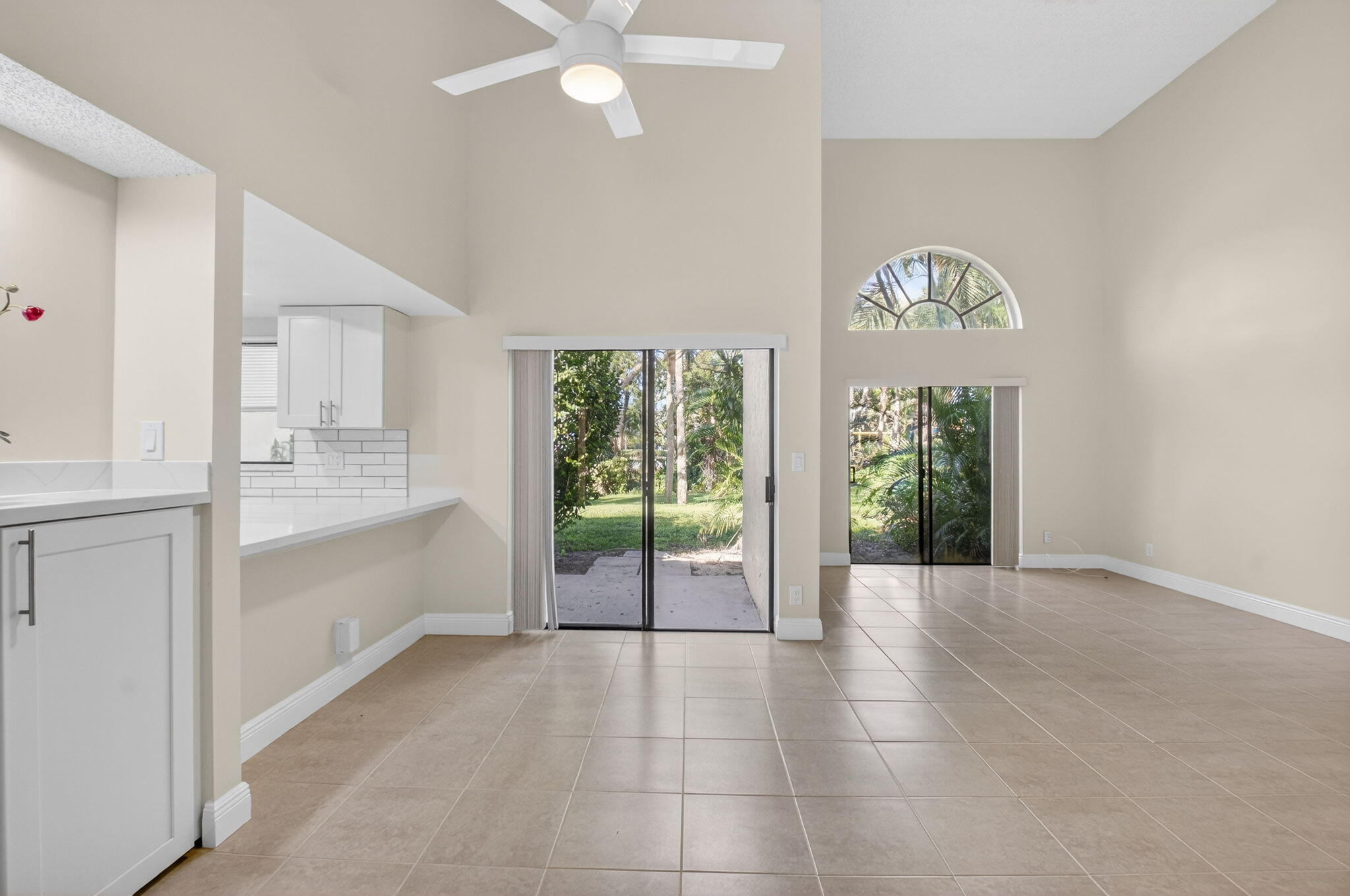 3143 Kingswood Terrace, Unit 3143 Boca Raton, FL 33431 - Photo 8 of 66 a view of an empty room and window