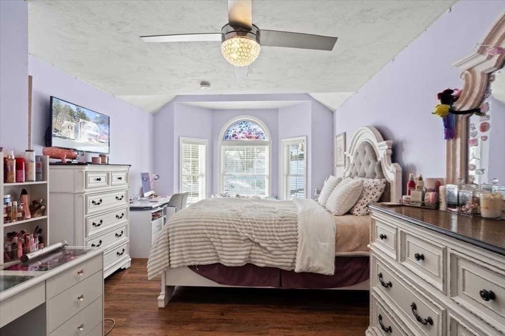 8 Wamsutta Ridge Road Charlton, MA 01507 - Photo 24 of 38 a bedroom with a bed a dresser and book shelf