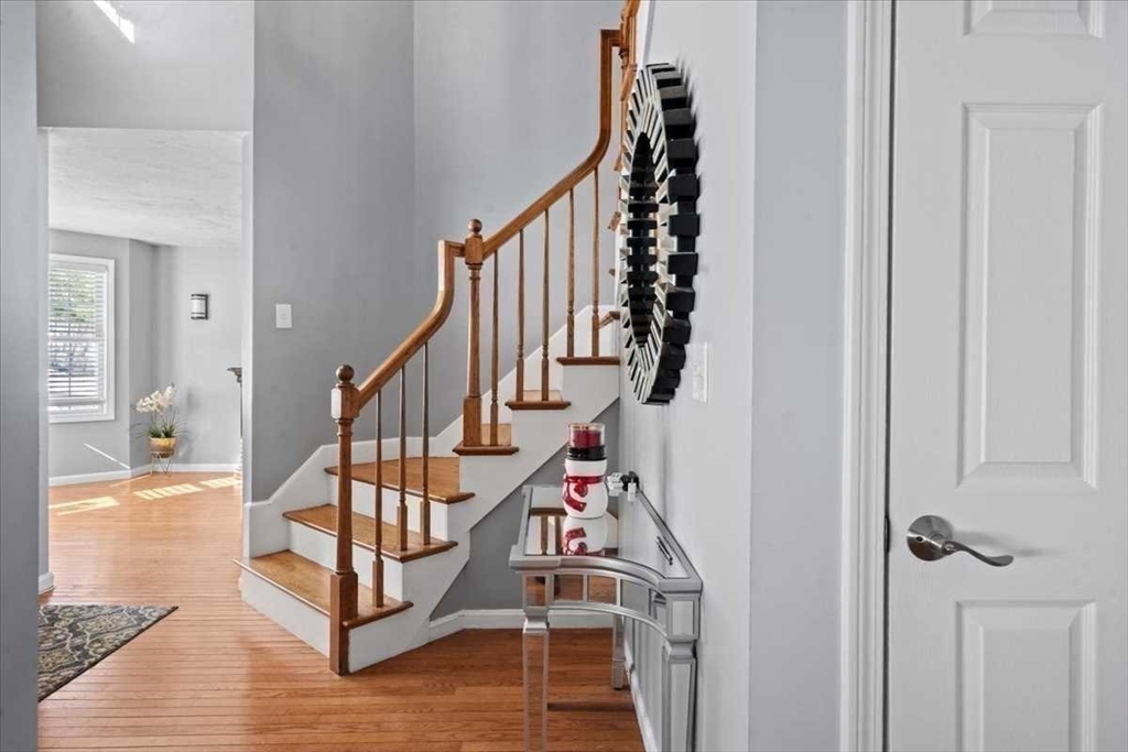 8 Wamsutta Ridge Road Charlton, MA 01507 - Photo 7 of 38 a view of entryway with wooden floor and stairs