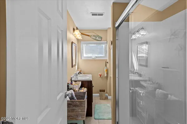 a bathroom with a mirror