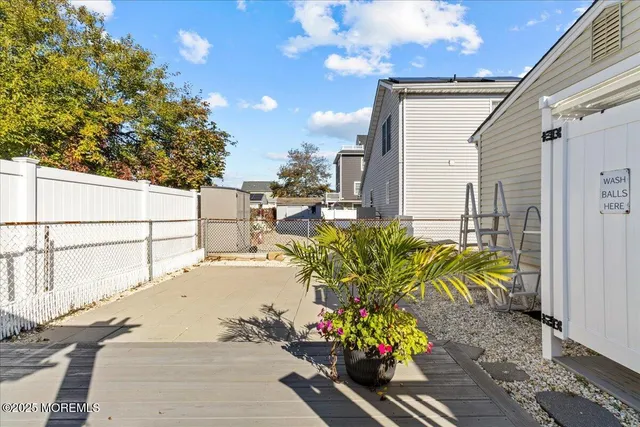 a view of path along with potted plants