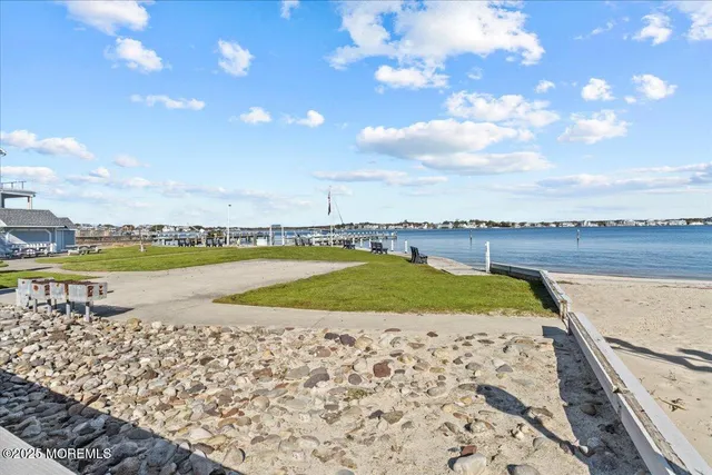 a view of a swimming pool with an ocean view