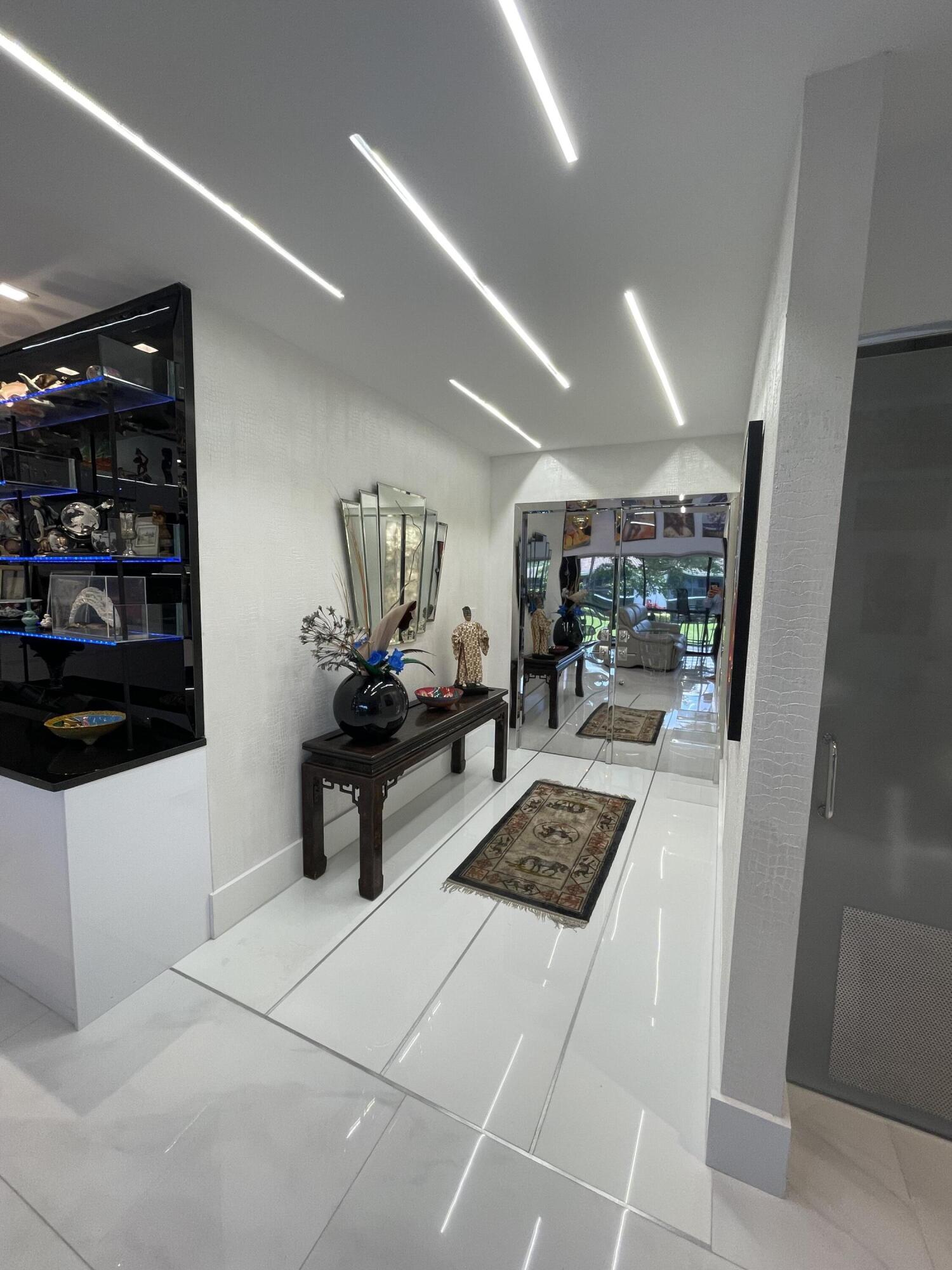 6748 Willow Wood Drive, Unit 1306 Boca Raton, FL 33434 - Photo 10 of 53 foyer