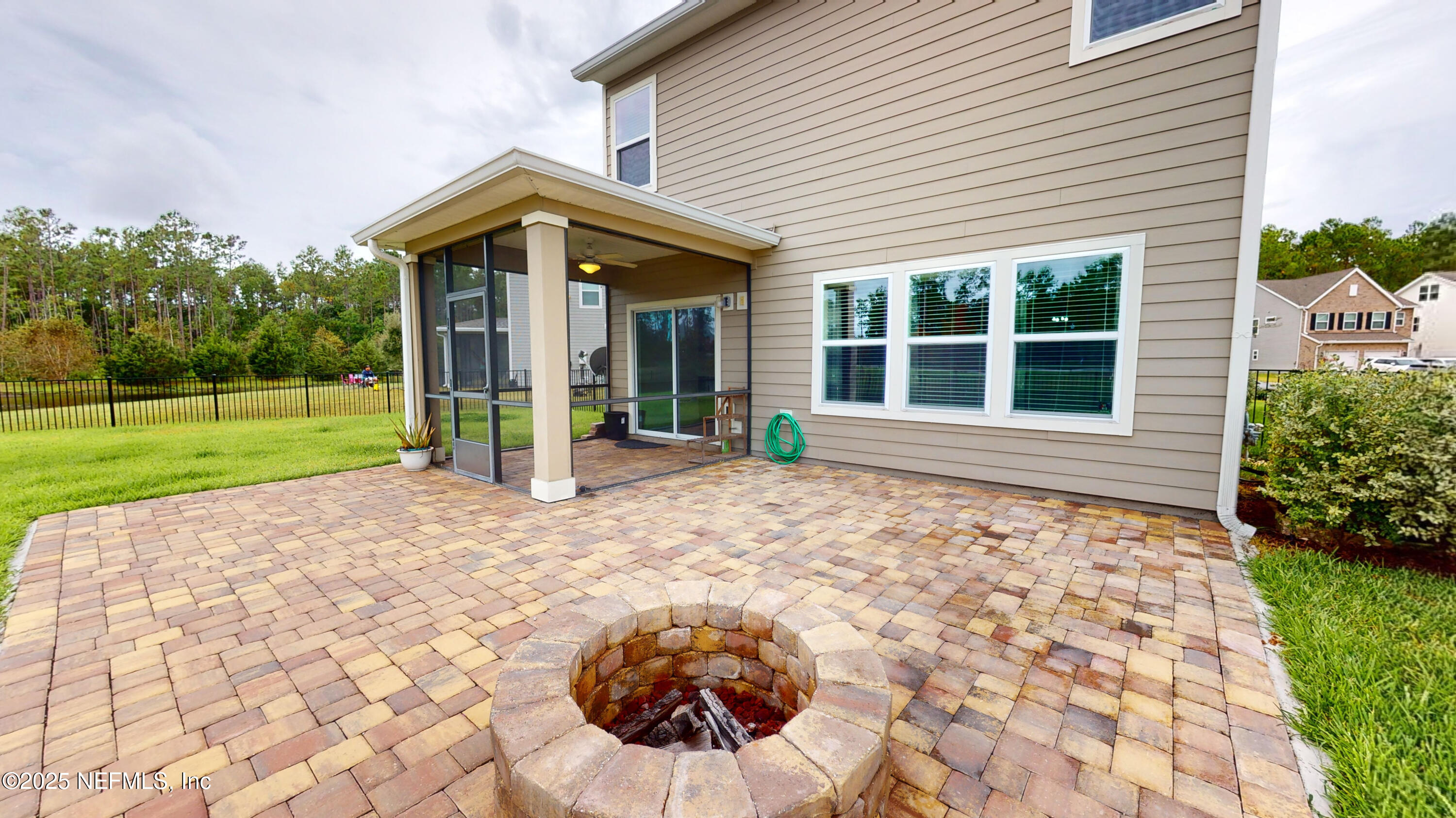 201 Silver Creek Place St. Augustine, FL 32095 - Photo 23 of 26 a view of a house with backyard and garden