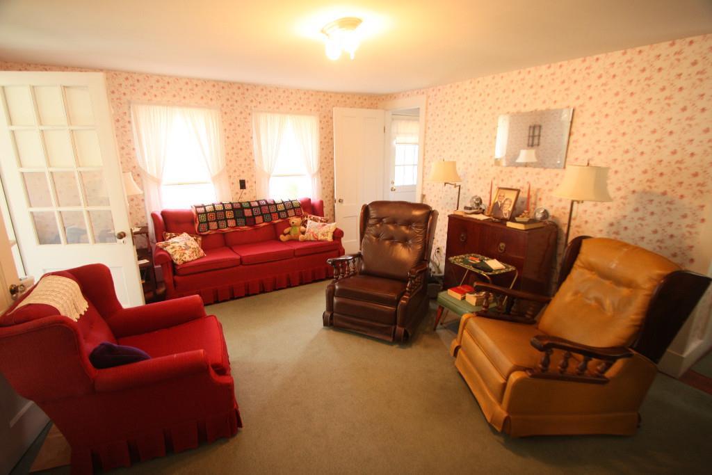 90 Bridgton Road Sebago, ME 04029 - Photo 10 of 22 Living room, facing road.