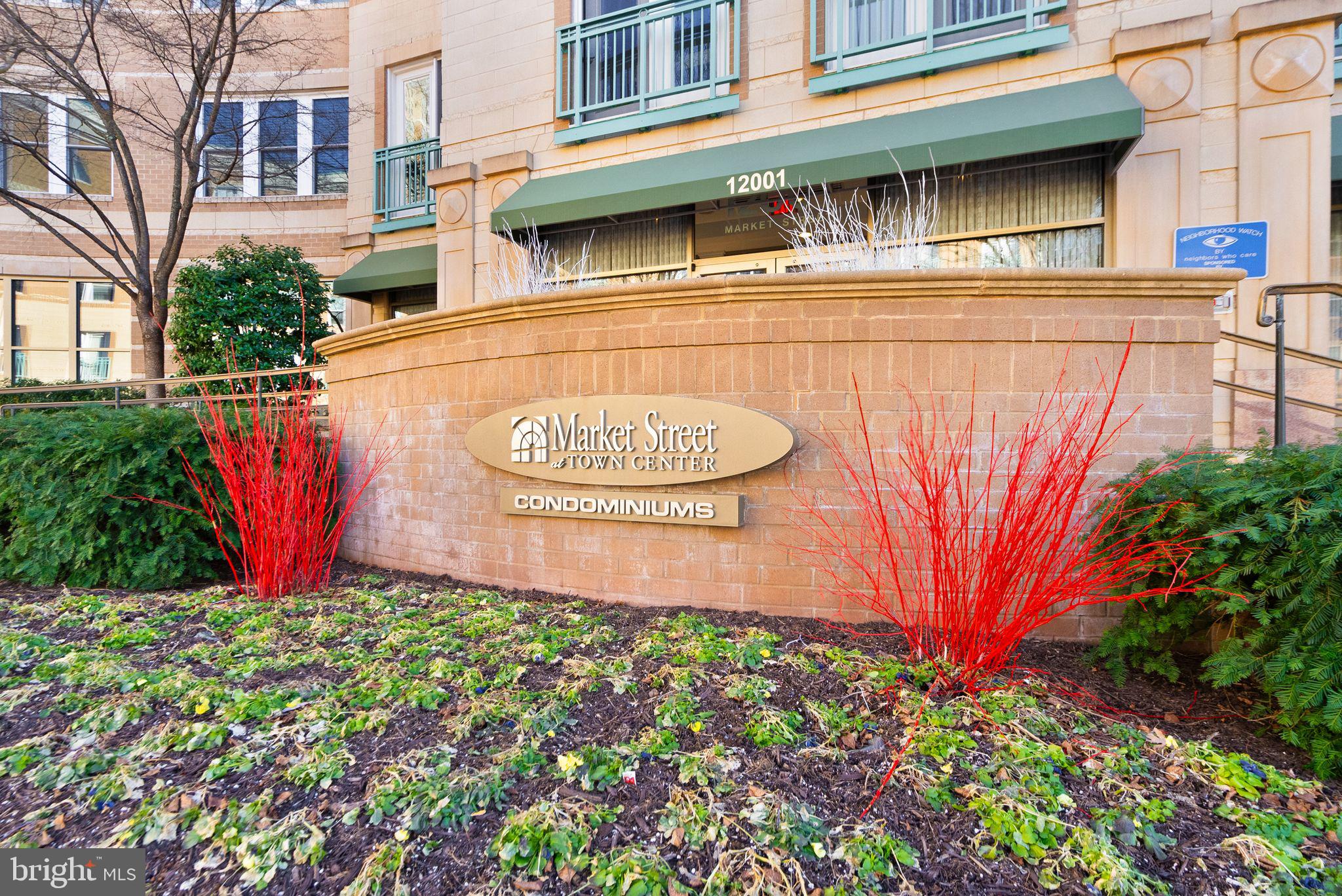 a sign that is on a brick building