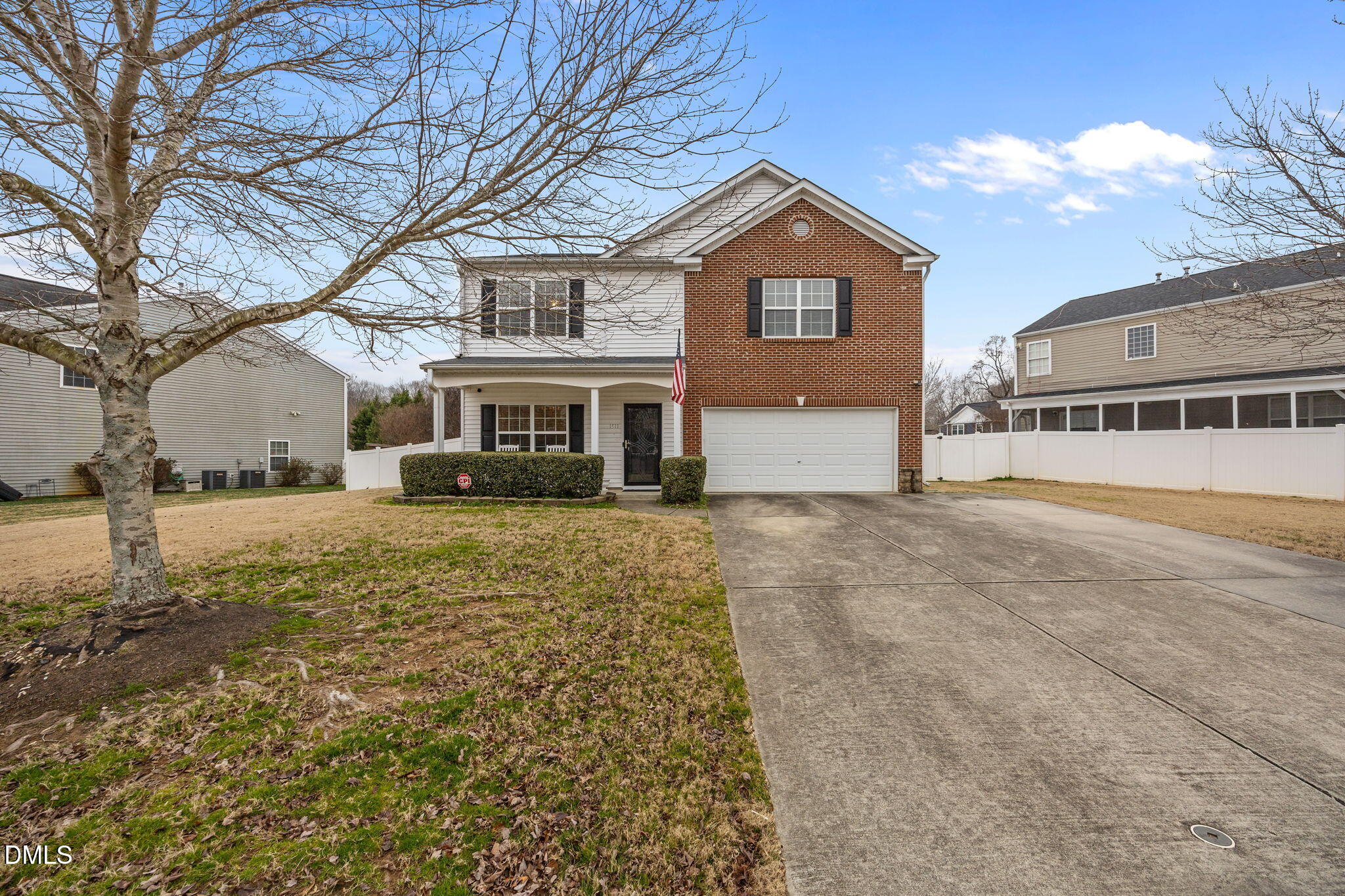 1511 Brambleton Court Graham, NC 27253 - Photo 1 of 43 a front view of a house with a yard
