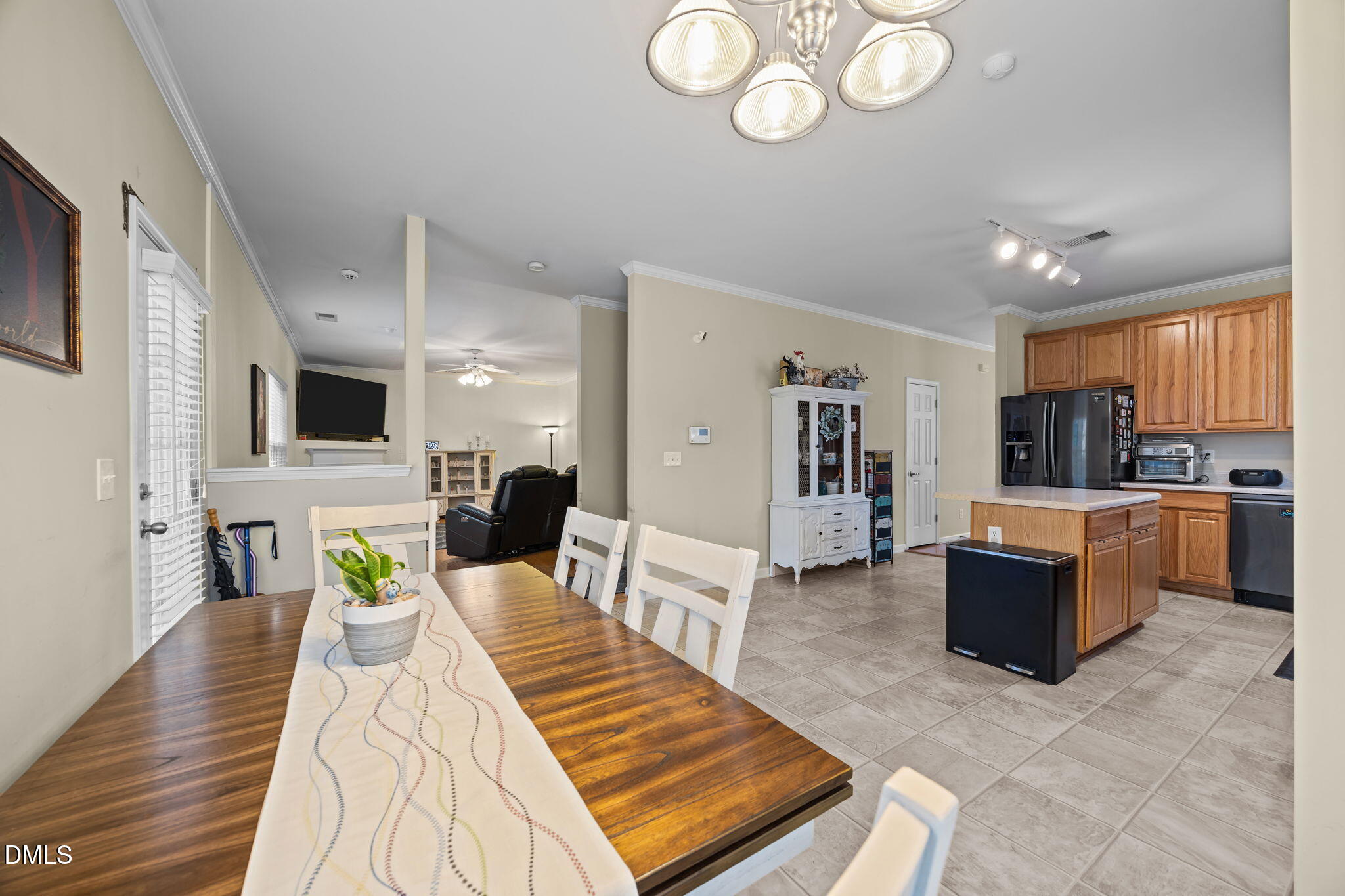 1511 Brambleton Court Graham, NC 27253 - Photo 11 of 43 a living room with furniture and a view of kitchen