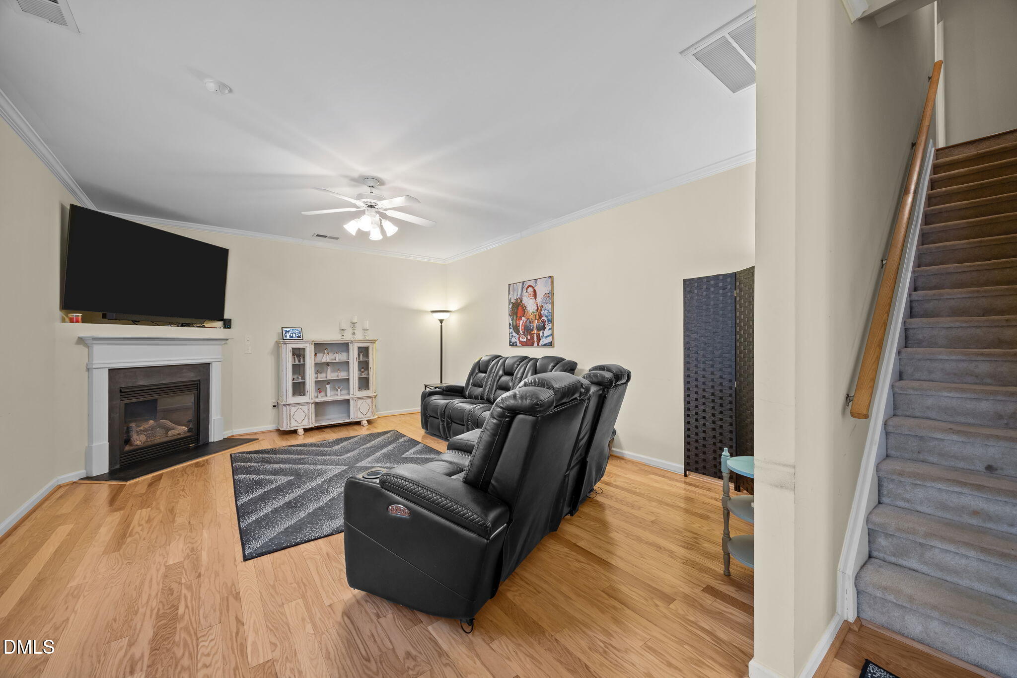 1511 Brambleton Court Graham, NC 27253 - Photo 13 of 43 a living room with furniture fireplace and flat screen tv