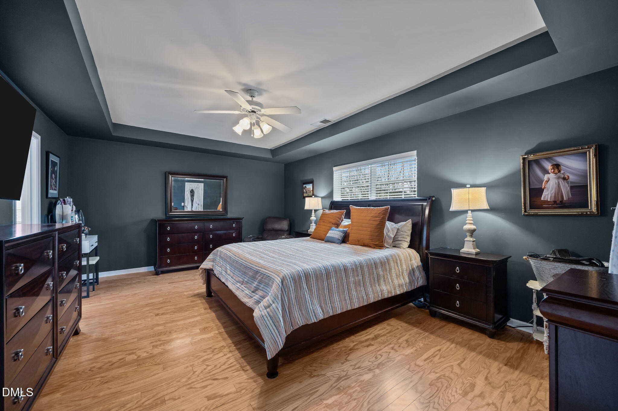 1511 Brambleton Court Graham, NC 27253 - Photo 16 of 43 a bedroom with a bed and a tv on table