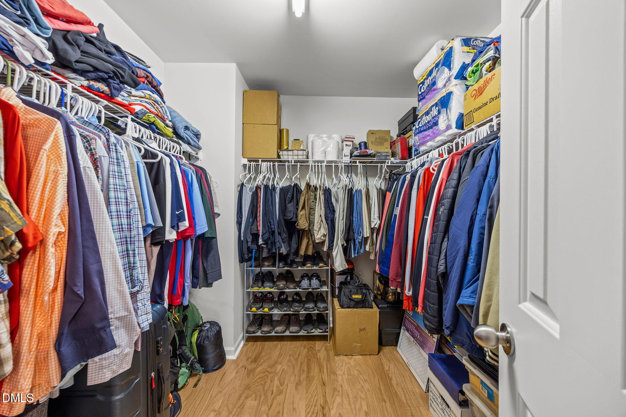 1511 Brambleton Court Graham, NC 27253 - Photo 18 of 43 a view of walk in closet with clothes