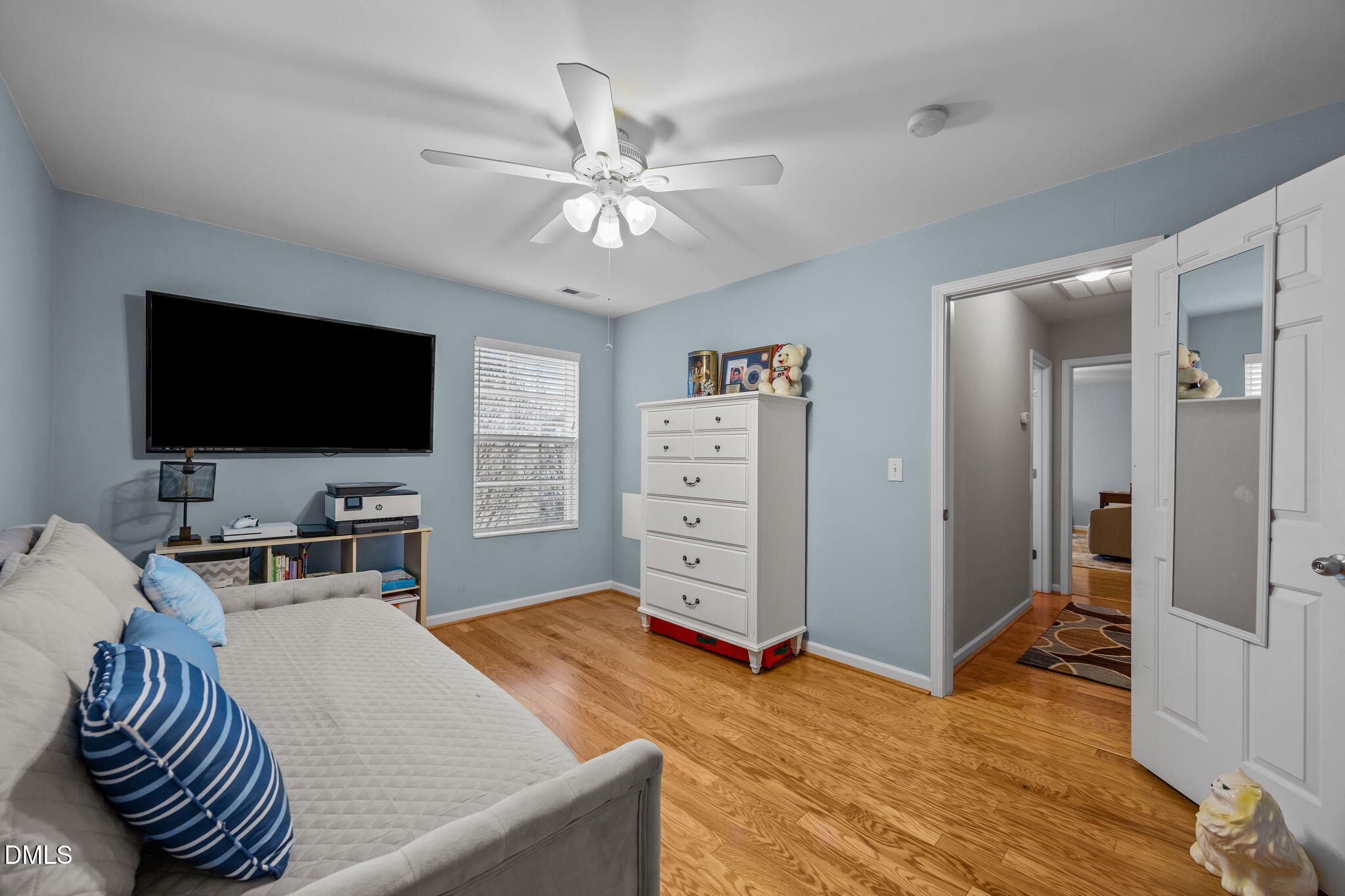 1511 Brambleton Court Graham, NC 27253 - Photo 24 of 43 a living room with furniture and a flat screen tv