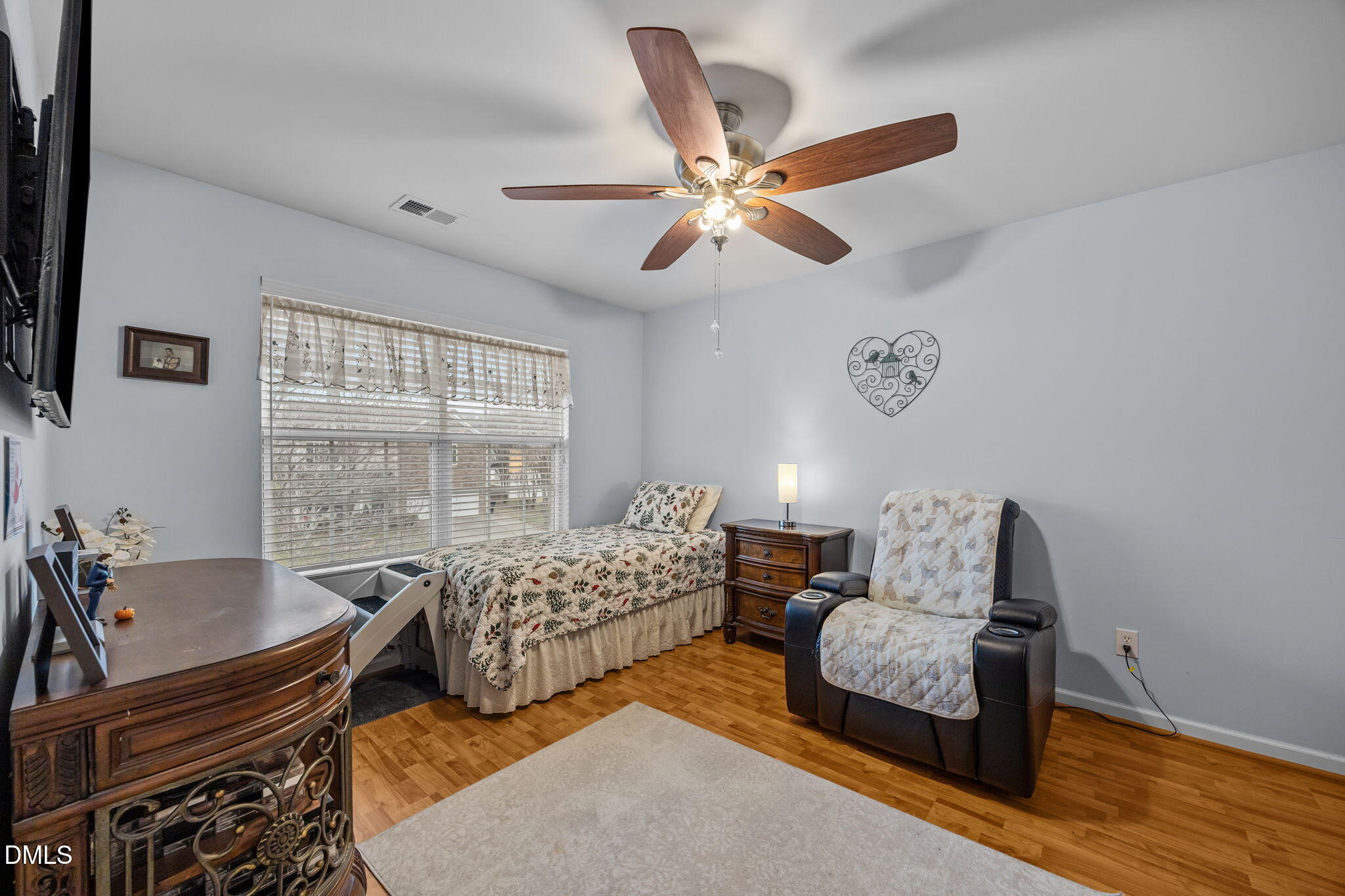 1511 Brambleton Court Graham, NC 27253 - Photo 29 of 43 a bedroom with furniture and wooden floor